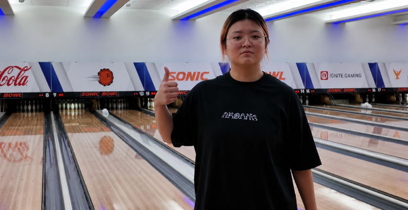Chloe bowling at SAFRA Punggol Sonic Bowl