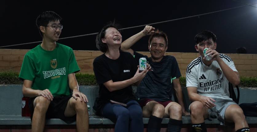 SAFRA Tampines Futsal Kakis June Lim having break with team