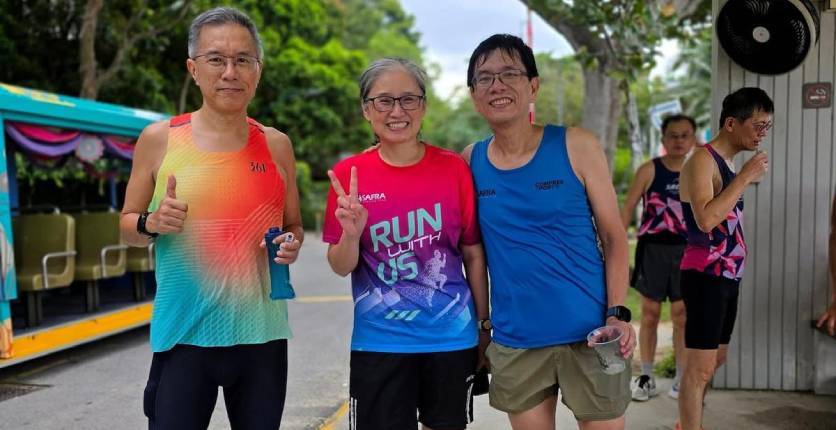Melvyn Sim with his wife and friend Man Wei