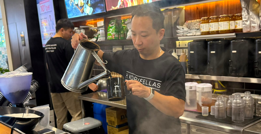 Terry Kopifellas making kopi