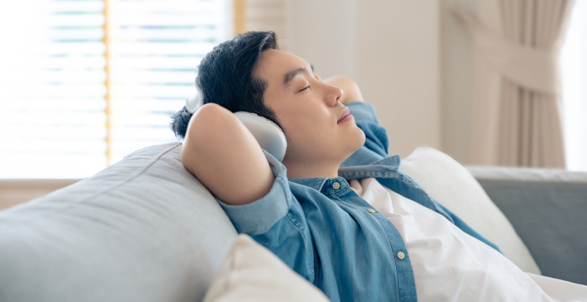 World Mental Health Day young man relaxing on couch